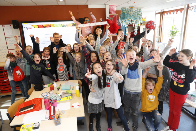 Topvoetballers voor de klas